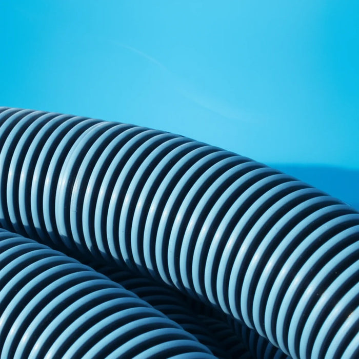 Close-up of the blue swimming pool vacuum hose ribs
