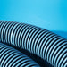 Close-up of the blue swimming pool vacuum hose ribs