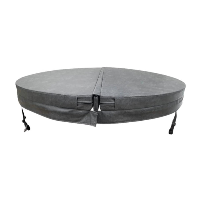 Front view of a charcoal grey circular spa pool cover, showing the insulated tapered profile, centre hinge and securing straps.
