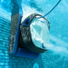 Robotic pool cleaner in action on a tiled pool floor