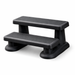 Black two-step spa steps with slip-resistant treads on a white background
