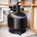 Black P Series fibreglass pool filter installed in a residential pool equipment area