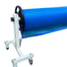 Blue solar pool cover wound onto a roller with wheeled support stand