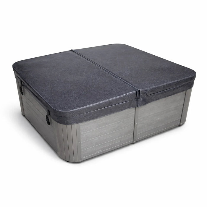 Charcoal spa cover fitted to a square spa, showing the centre fold and securing clips