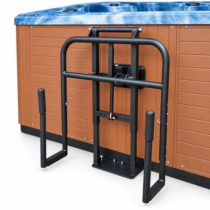 Black undermount cradle cover lifter installed beside a spa