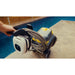 Zodiac CX-series robotic pool cleaner on its caddy with coiled cable